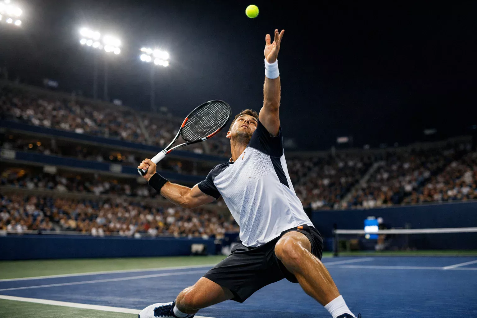 Tennisspieler konzentriert beim entscheidenden Aufschlag im Tiebreak
